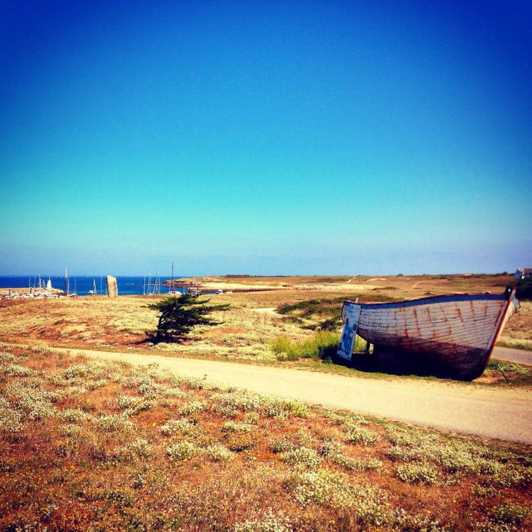 boat on barren landscape - hoedic