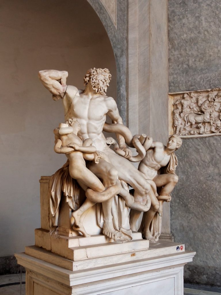 A sculpture of Laocoön and His Sons inside the Vatican Museum, inserted in a post about Sistine Chapel tickets
