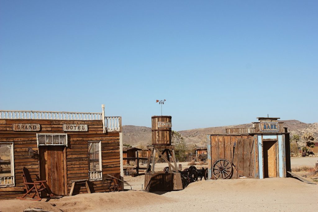 Wooden constructions in a desert landscape, imitating a western town 