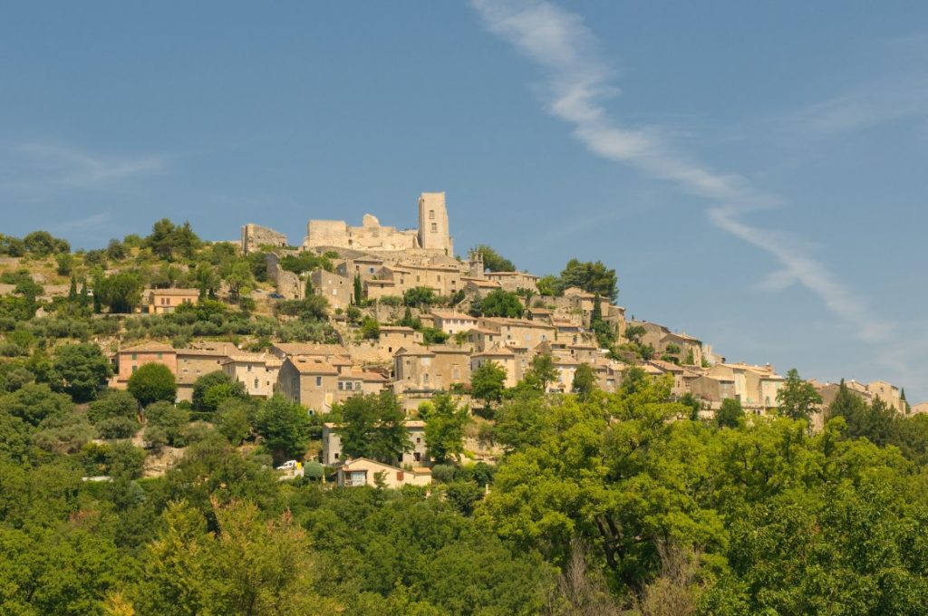 Visiting the charming villages in Provence such as Lacoste is one of the best day trips from Aix en Provence.