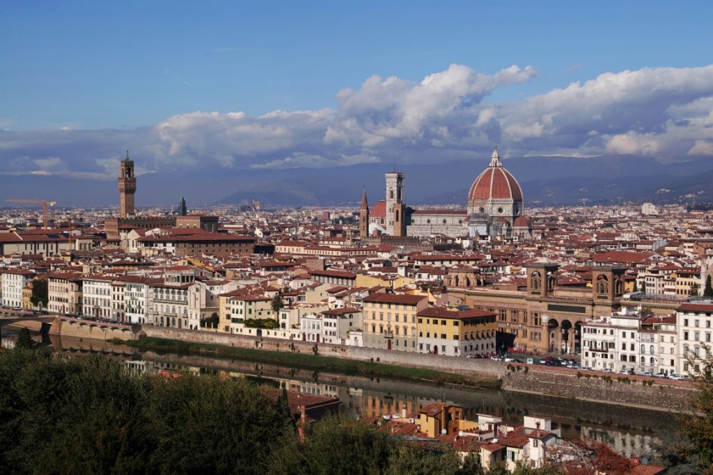 The skyline of Florence, with Santa Maria del Fiore Cathedral standing out, seen from across the river 