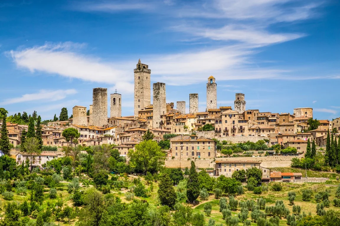 San Gimignano and its medieval towers rising above the Tuscan countryside.