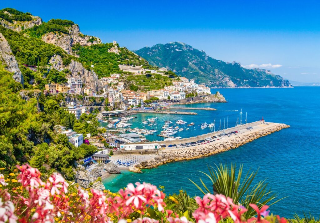 Picture of the Amalfi Coast, with the blue waters of the Gulf of Naples on the right inserted ina  post about the best Amalfi Coast Tours from Rome. 