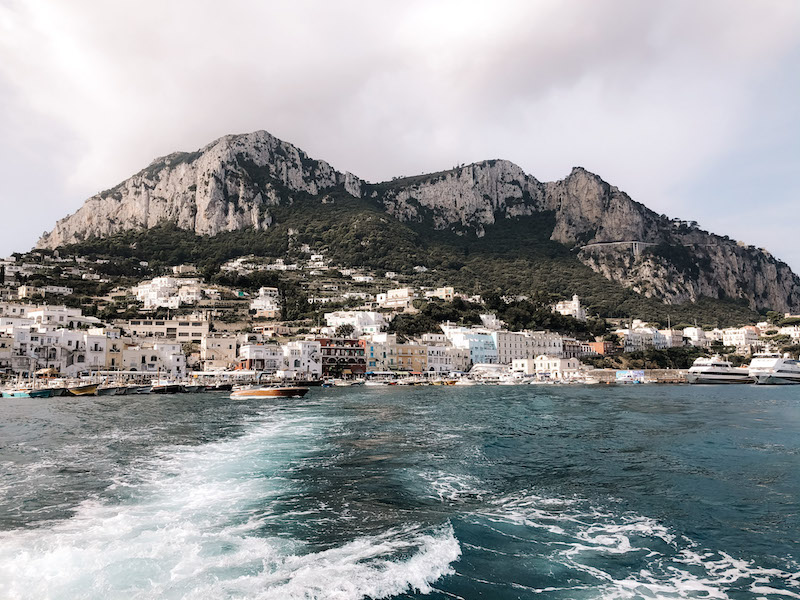 image of Capri from a boat, inserted in a post about the best capri boat tours from Amalfi.