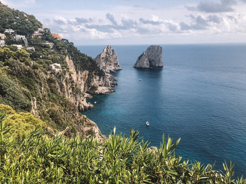 Image of the famous Faraglioni of Capri inserted in a post about the best Capri tours from Rome.