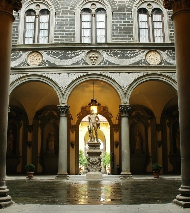 Courtyard of Palazzo Medici Riccardi in Florence with a statue in the center