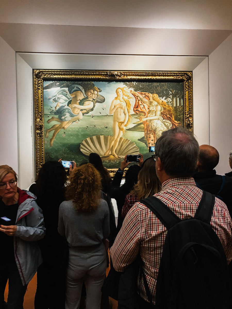 Visitors admiring Botticelli’s The Birth of Venus at the Uffizi Gallery in Florence.