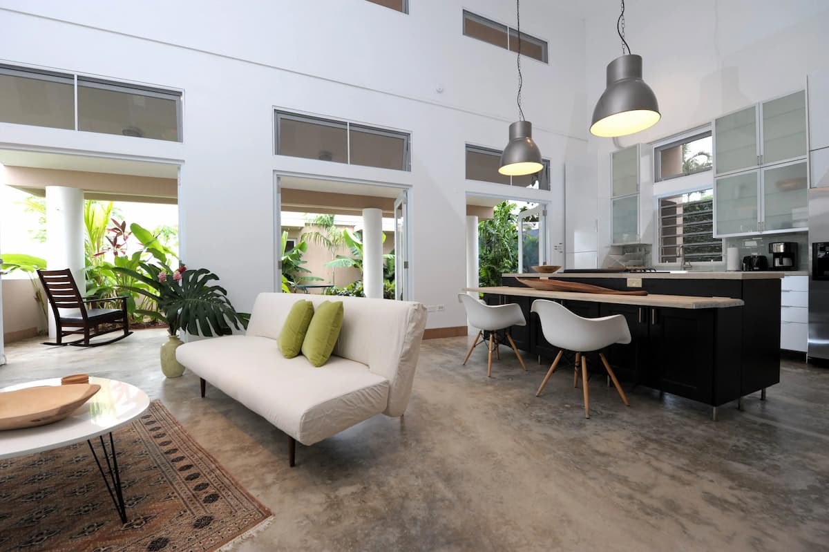 Bright living area and full kitchen at 4 Casitas in Cabo Rojo, Puerto Rico.